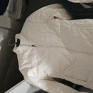 2 white The North Face jackets. One is a small & the other is a Lg. 1 S black